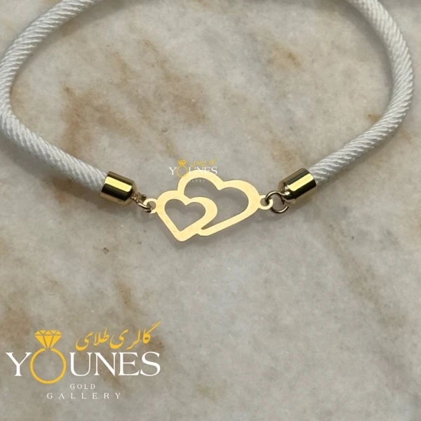 تصویر دوم دستبند دوقلب طلا لیزری